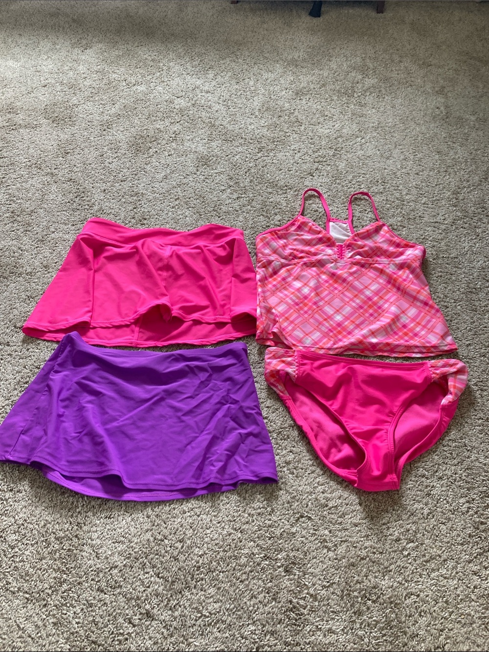 Size 16 girls swimsuit with two swim skirts